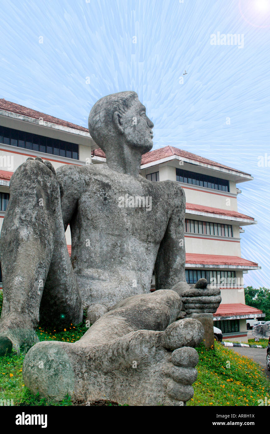 Sculpture Of A Man Sitting Up At Technopark Concept Is Awakening Sleeping Giant Waking Up To