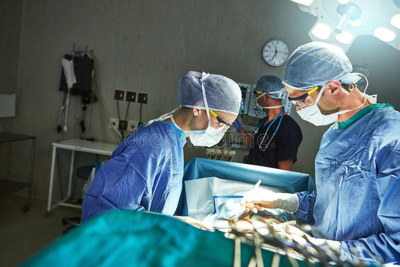 Staying Focused Under Pressure Surgeons In An Operating Room Stock Image Image Of Copyspace